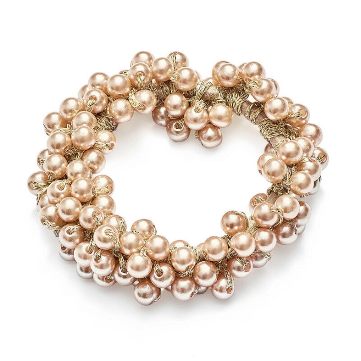 guldpärlat hårband, eleganta håraccessoarer, lyxiga hårband, högkvalitativa hårprodukter, stilfull, modeaccessoarer, guld pärlor, unik design