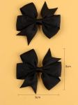 svarta hårspännen, rosett hårspännen, flickors håraccessoarer, eleganta hårspännen, barnmode, unik styling, accessoarer för flickor, mode för barn
