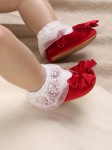 babyskor, röda skor, skor med rosetter, barnsäkerhet, högkvalitativa barnskor, första stegen skor, eleganta barnskor, bekväma barnskor