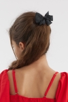 svarta hårspännen, rosett hårspännen, flickors håraccessoarer, eleganta hårspännen, barnmode, unik styling, accessoarer för flickor, mode för barn