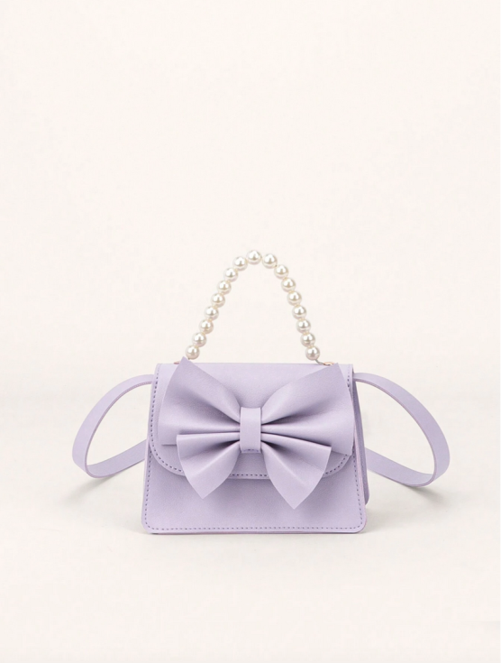 lavenderväska flicka, handväska med rosett, barnväska lavendel, elegant flickväska, presentidé för flickor