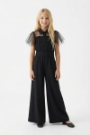 elegant flickjumpsuit blair i svart färg bakifrån, flickjumpsuit detalj, festlig jumpsuit för flicka, kvalitetsutförande