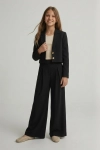 festlig flickkostym emi i svart färg materialdetalj, kvalitetstyger, flickkostym ZOYA, omsorgsfullt utförande