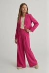 festlig flickkostym emi i fuchsia färg bakifrån, flickkostym detalj, festlig kostym för flicka, kvalitetsutförande